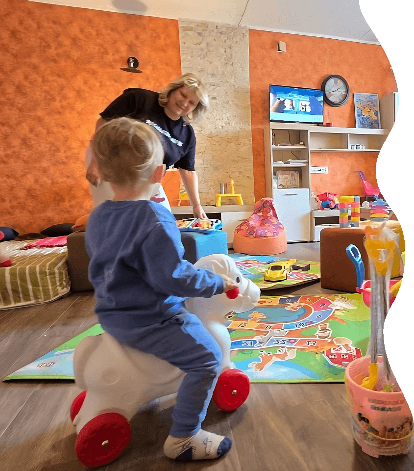 Gudauri Kids Club – teacher and child in playroom